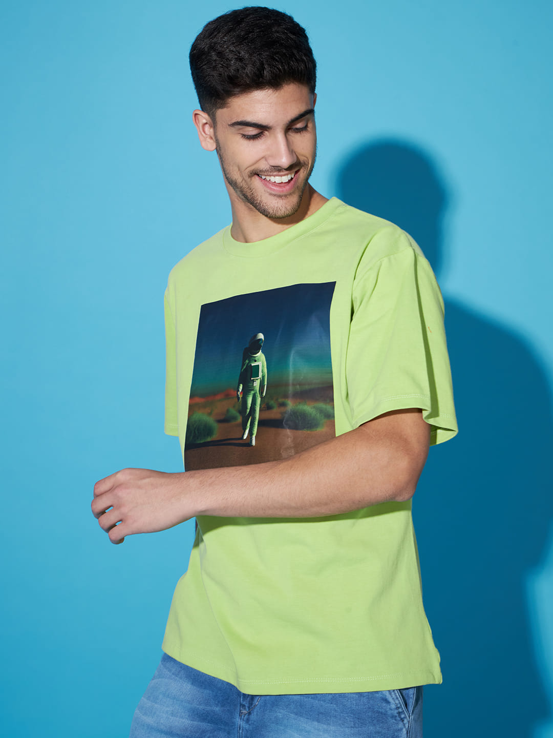 Majestic Echoes: A Men's Oversized Green Printed T-Shirt