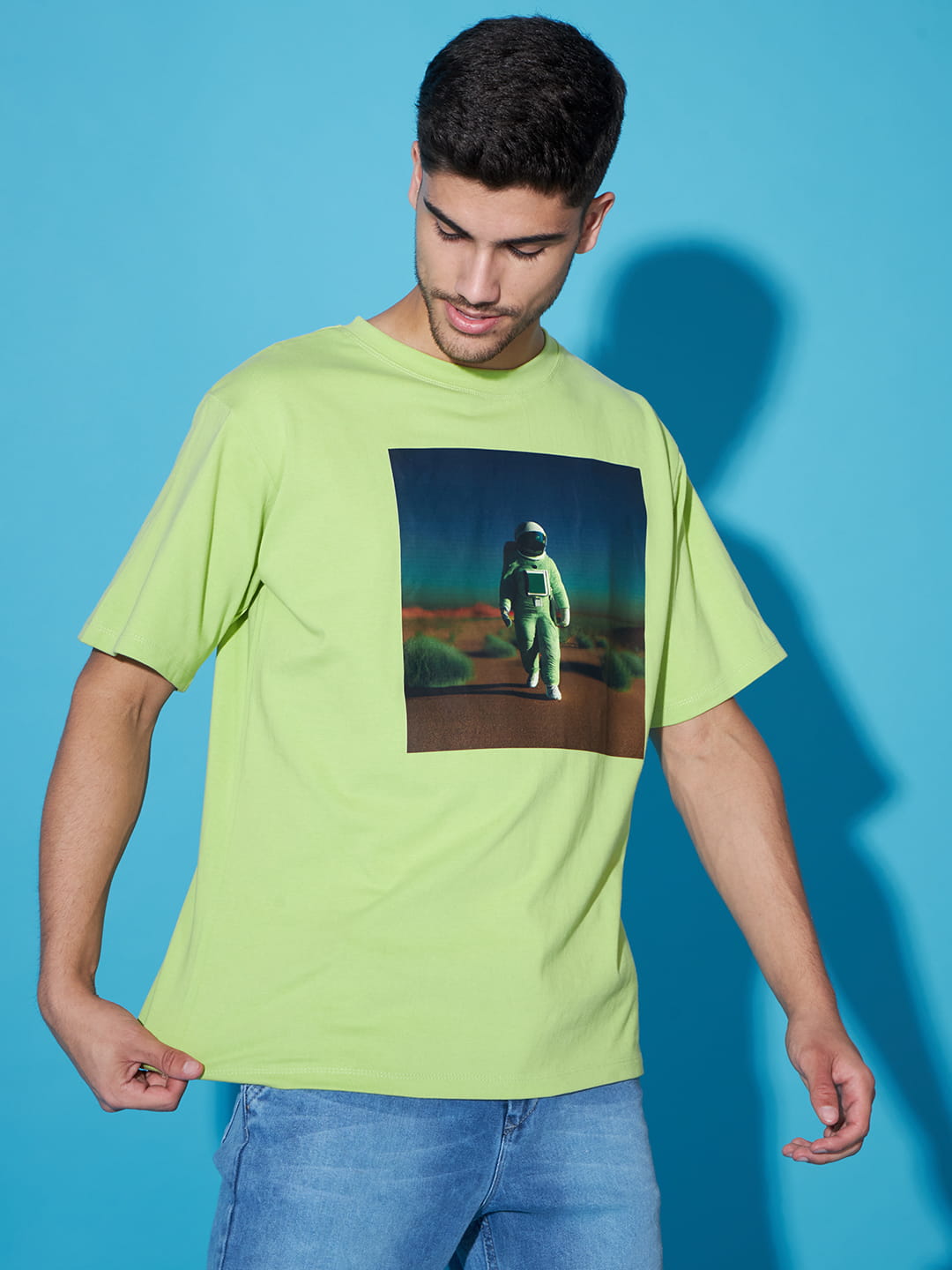 Majestic Echoes: A Men's Oversized Green Printed T-Shirt