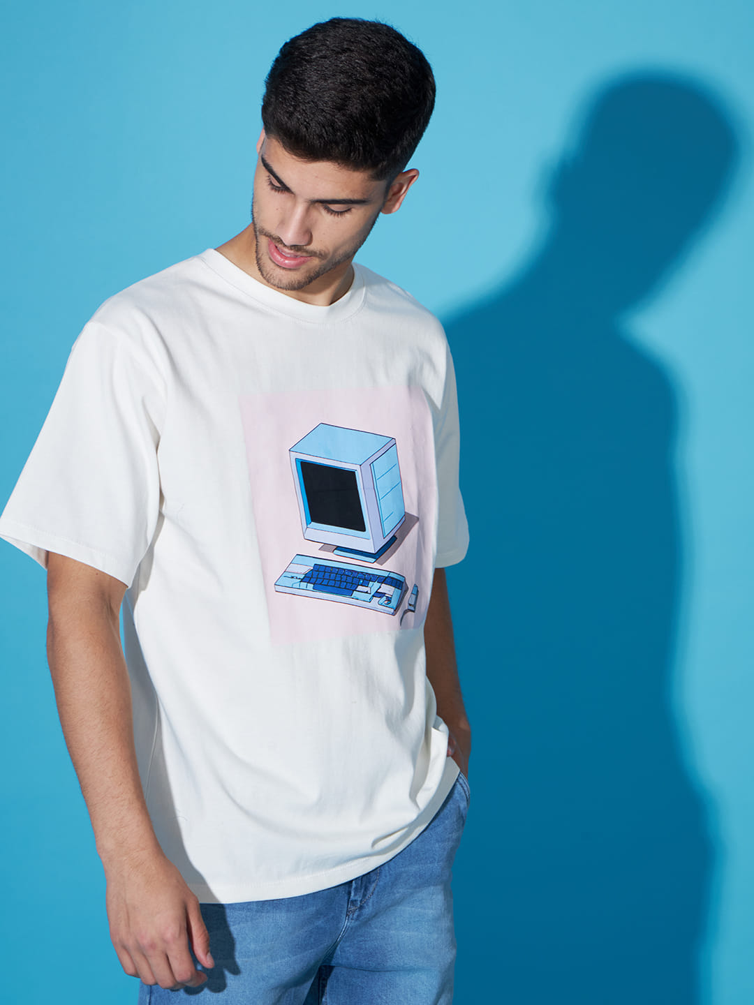 Digital Mirage: A Men's Oversized White T-Shirt with Front Print