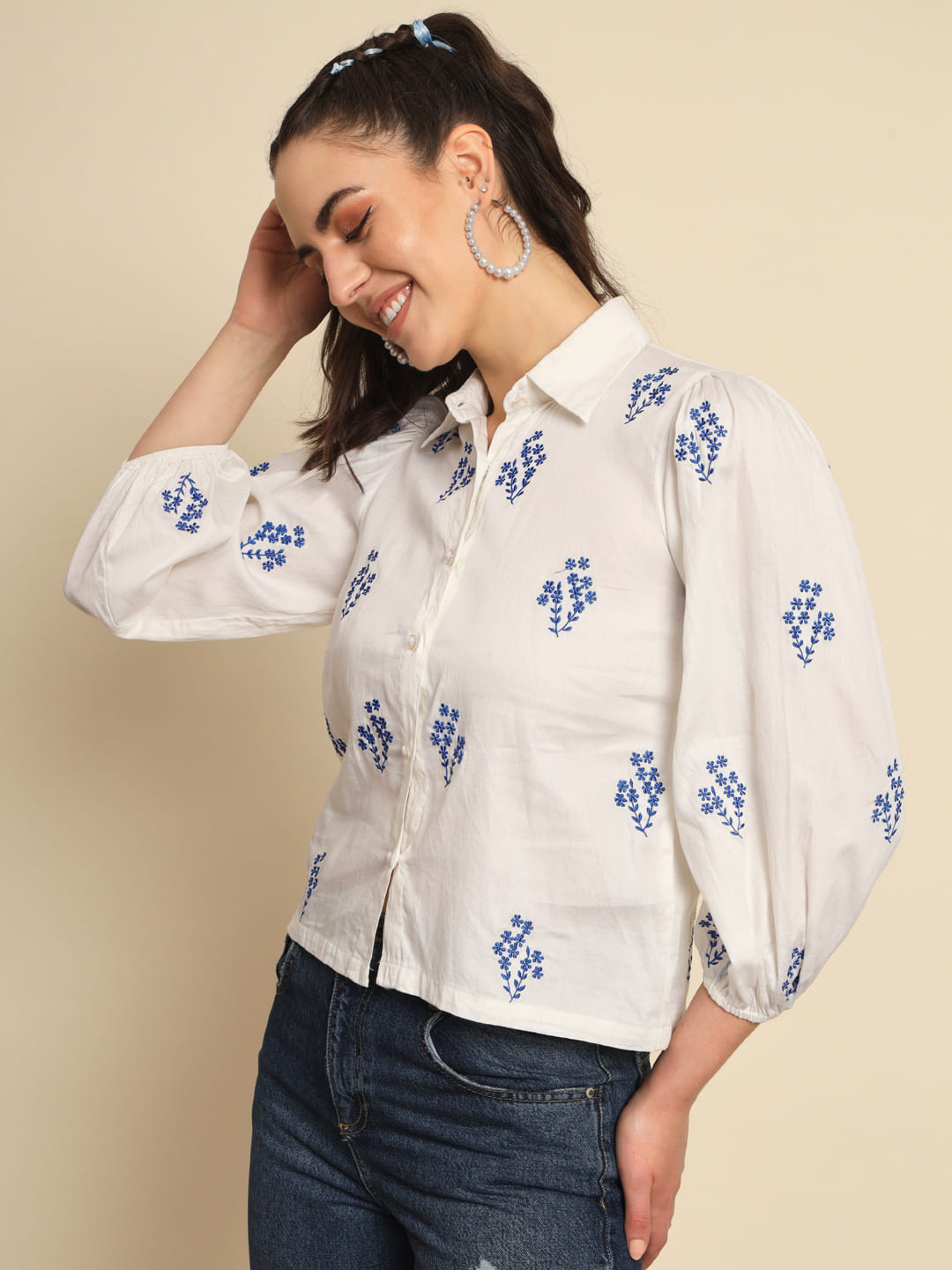 Whispers of Azure: A White Cotton Shirt with Blue Embroidery