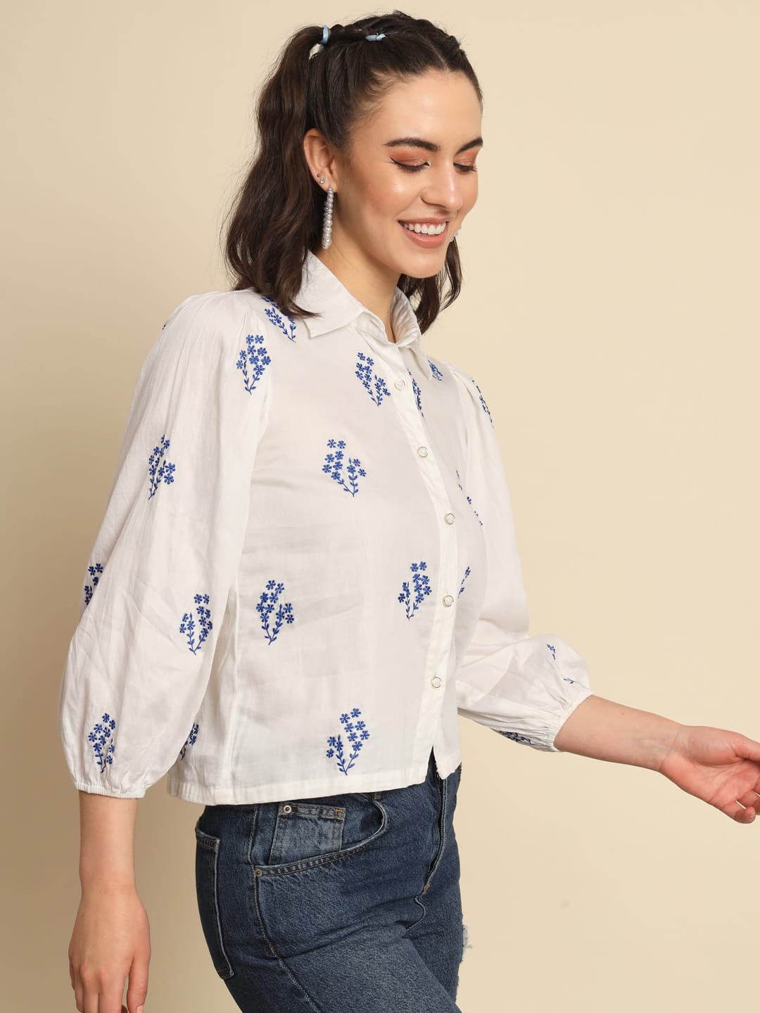 Whispers of Azure: A White Cotton Shirt with Blue Embroidery