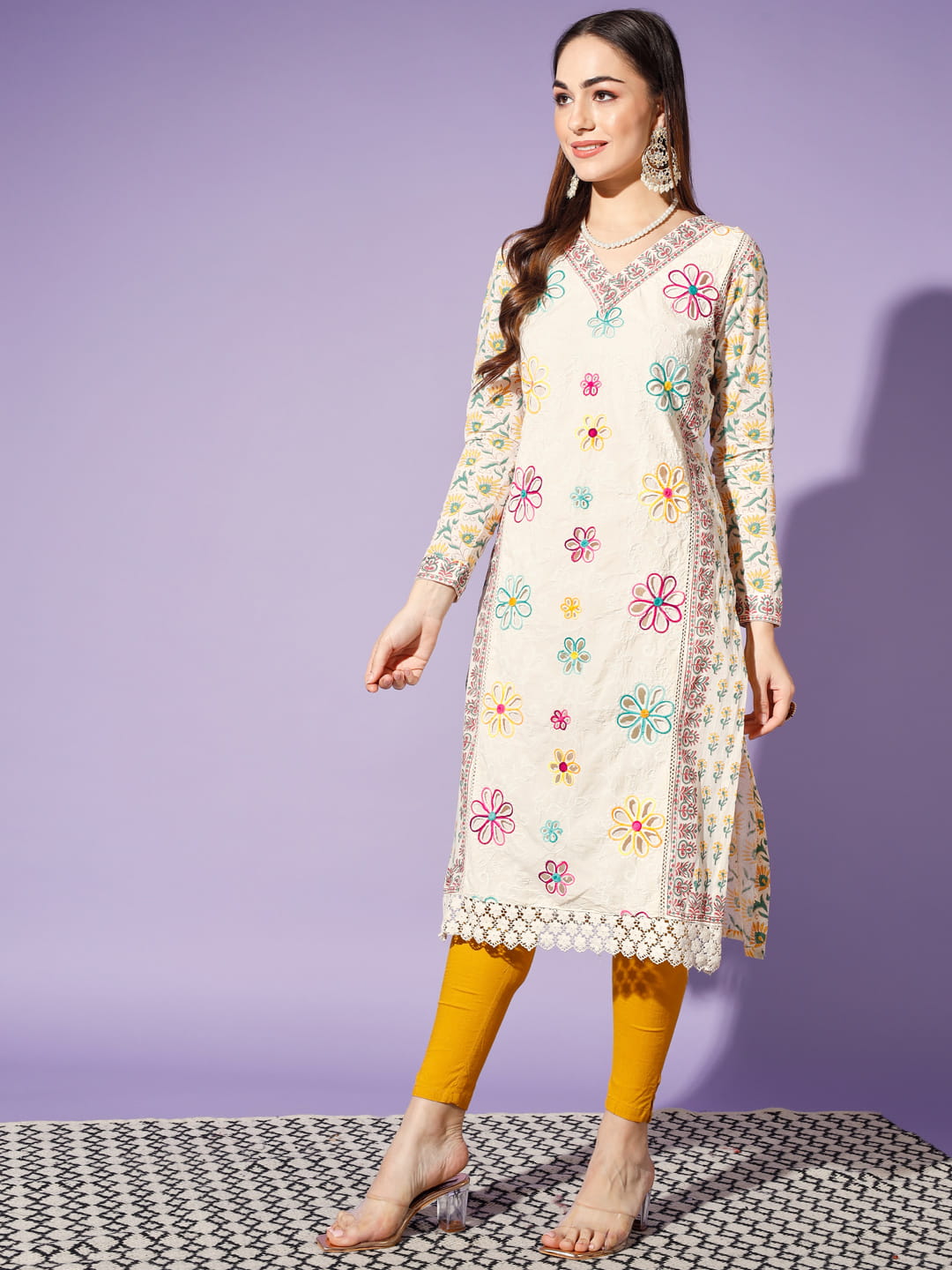 Blossoming Whispers: A White Kurti Adorned with Embellished Flowers | Hues of India