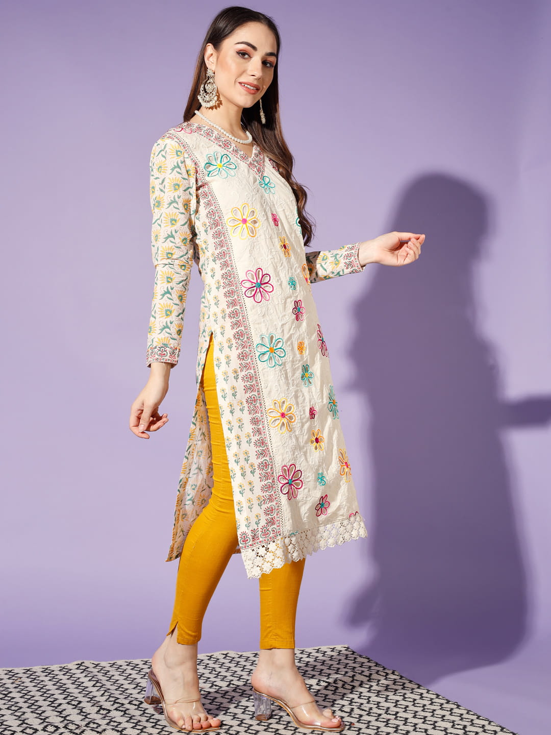 Blossoming Whispers: A White Kurti Adorned with Embellished Flowers | Hues of India