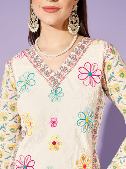 Blossoming Whispers: A White Kurti Adorned with Embellished Flowers | Hues of India