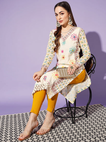 Blossoming Whispers: A White Kurti Adorned with Embellished Flowers | Hues of India