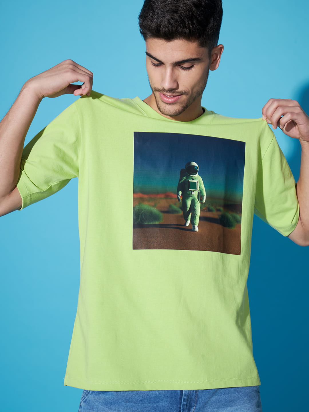 Majestic Echoes: A Men's Oversized Green Printed T-Shirt