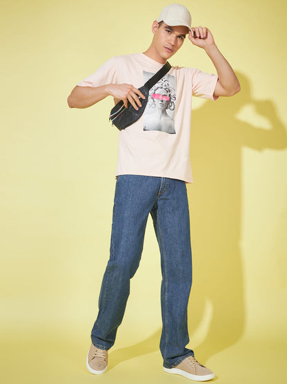 Blushing Whispers: Light Pink Oversized Printed T-Shirt